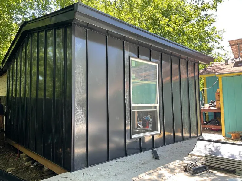 Black standing seam metal wall panels for Metal Roof Installation in Seven Hills