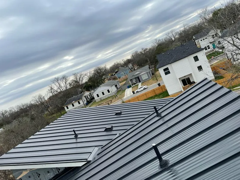 Standing seam metal roof panels with vents for Skylight Repair in Seven Hills